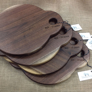 round charcuterie boards with handles on each end and holes in handles  by Michael's Woodcrafts Greenville SC woodworkers woodworking