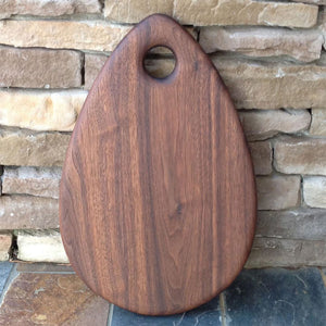 teardrop shaped walnut cutting board, serving board by Michael's Woodcrafts Greenville SC woodworkers woodworking artist