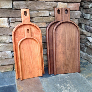 Four eautiful cherry and walnut charcuterie serving boards by Michael's Woodcrafts