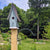 large bluebird house painted country blue with brown tin tall pointed roof Michael's Woodcrafts Greenville SC woodworking
