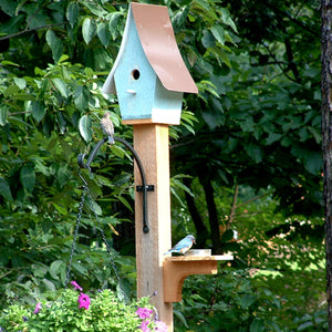 Bluebird house on top of 4 x 4 cedar post with two bluebirds sitting on post Michael's Woodcrafts Greenville SC woodworkers woodworking