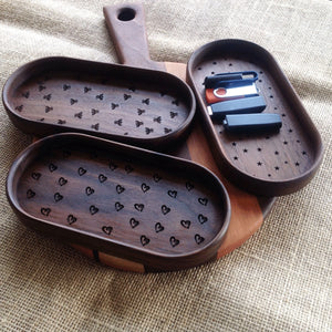 Three Walnut catchall trays with different engravings on the bottom, hearts, starts or bees by Michael's Woodcrafts Greenville SC woodworker Woodworking artist woodworkers