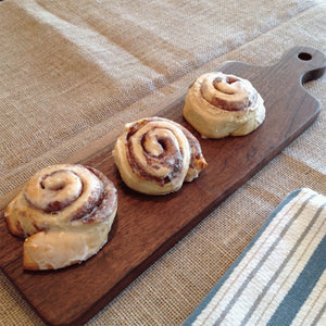 Walnut bread board with 3 large warm homemade cinnamon rolls  by Michael's Woodcrafts Greenville SC woodworkers woodworking