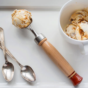 handcrafted ice cream scoop with maple and padauk wood, scoop is full of caramel cream ice cream  by Michael's Woodcrafts Greenville SC woodworkers woodworking