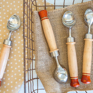 Four ice cream scoops with burlap and polka dot cloth background