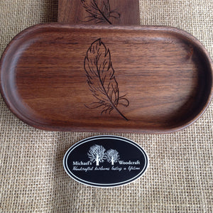Handcrafted walnut catchall tray 4 x 8 inches with a beautiful feather engraved on the bottom  by Michael's Woodcrafts Greenville SC woodworker Woodworking artist woodworkers